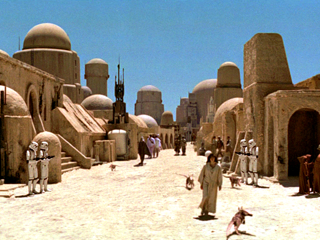 Street in Mon Eisley with people walking through